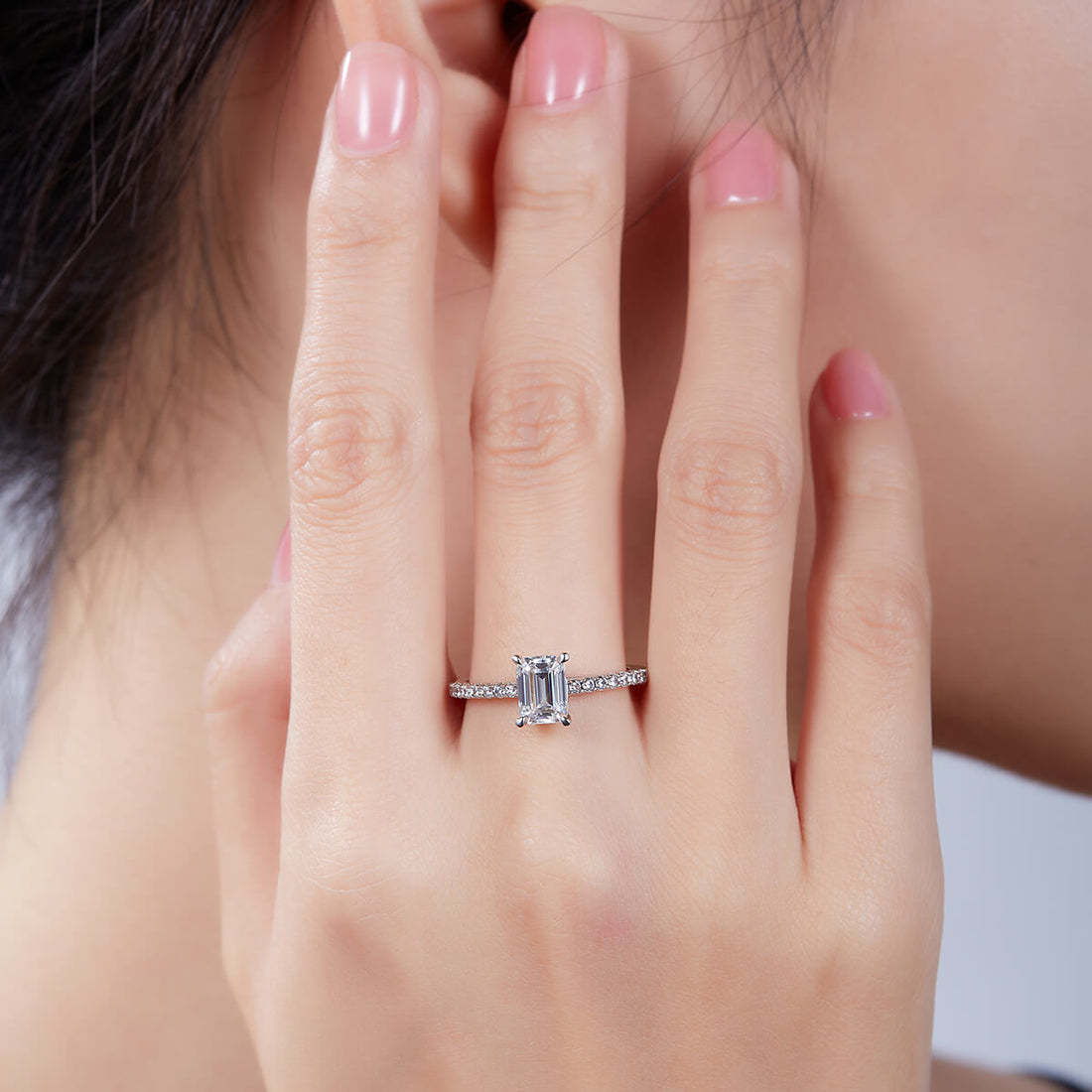 Half pave emerald cut Moissanite solitaire engagement ring