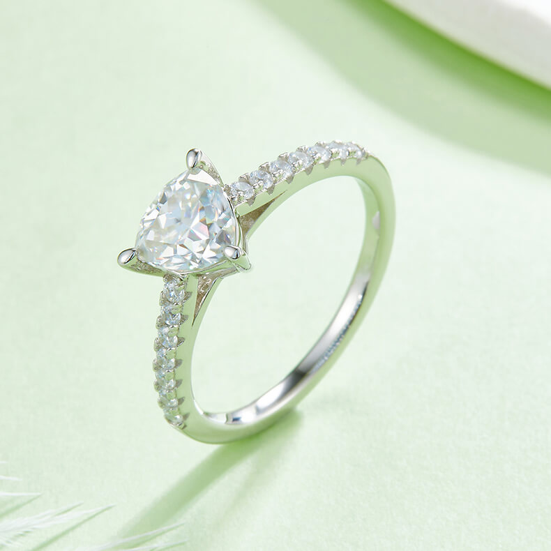 Half pave trillion cut Moissanite solitaire engagement ring