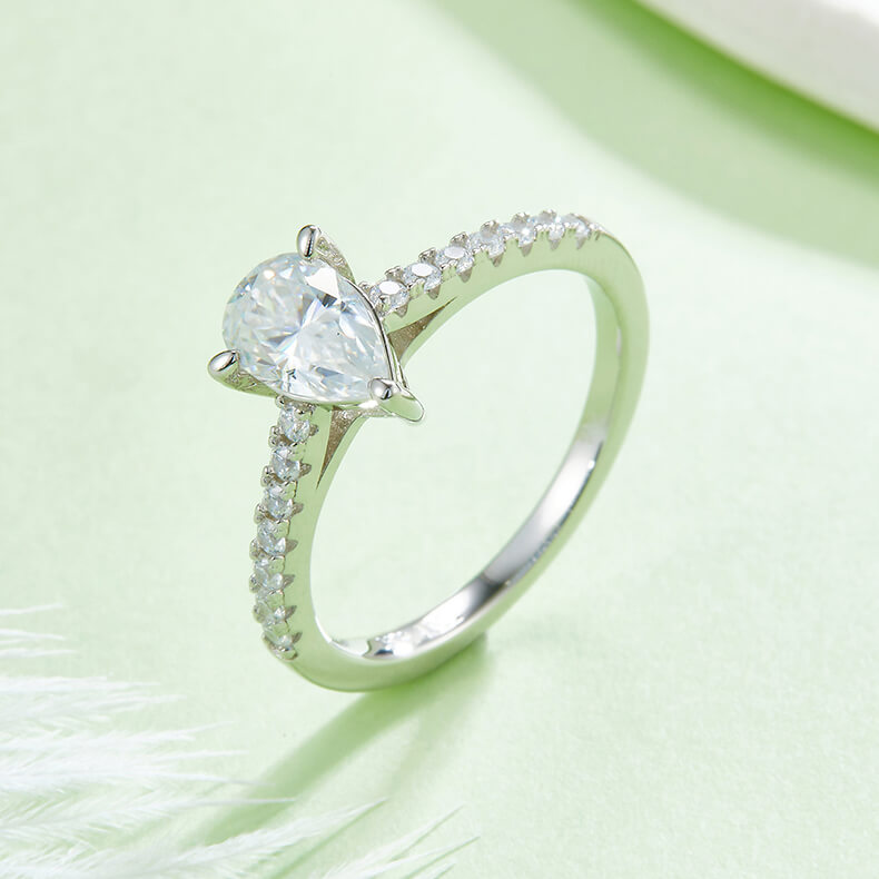 Half pave pear cut Moissanite solitaire engagement ring