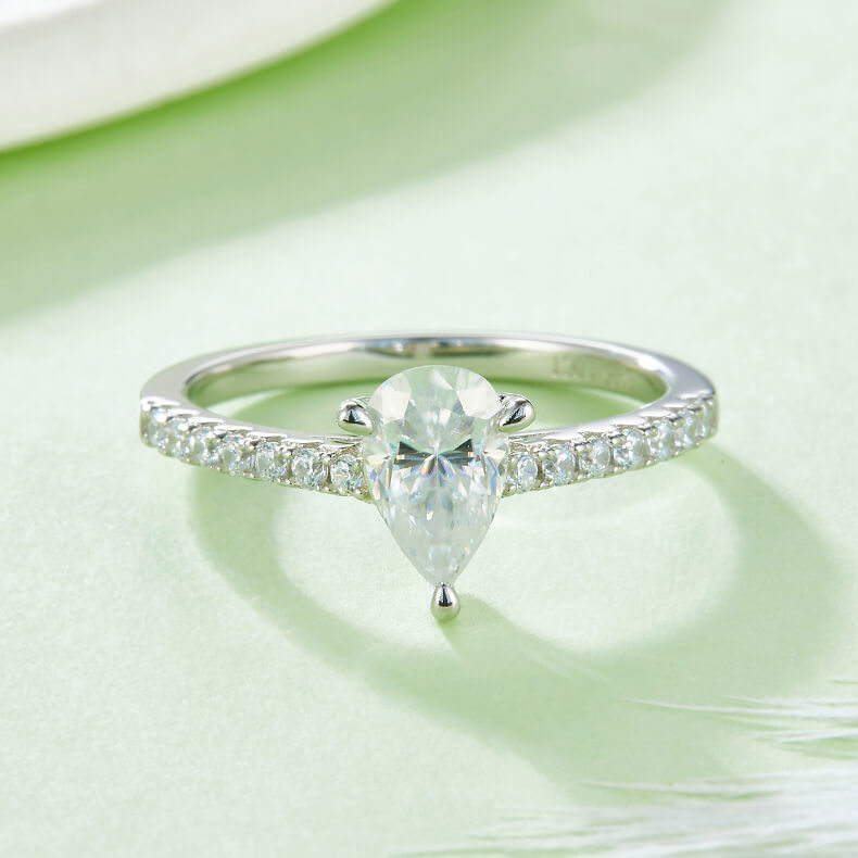 Half pave pear cut Moissanite solitaire engagement ring