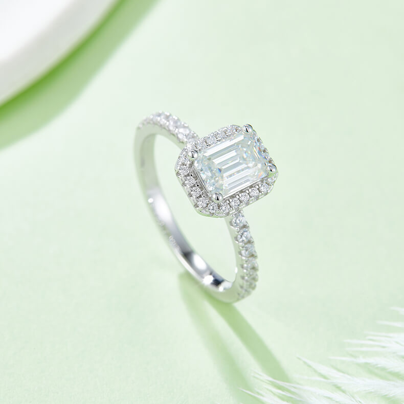 Emerald cut Moissanite halo engagement ring