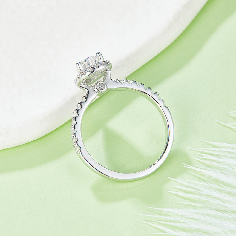 Pear cut Moissanite halo engagement ring