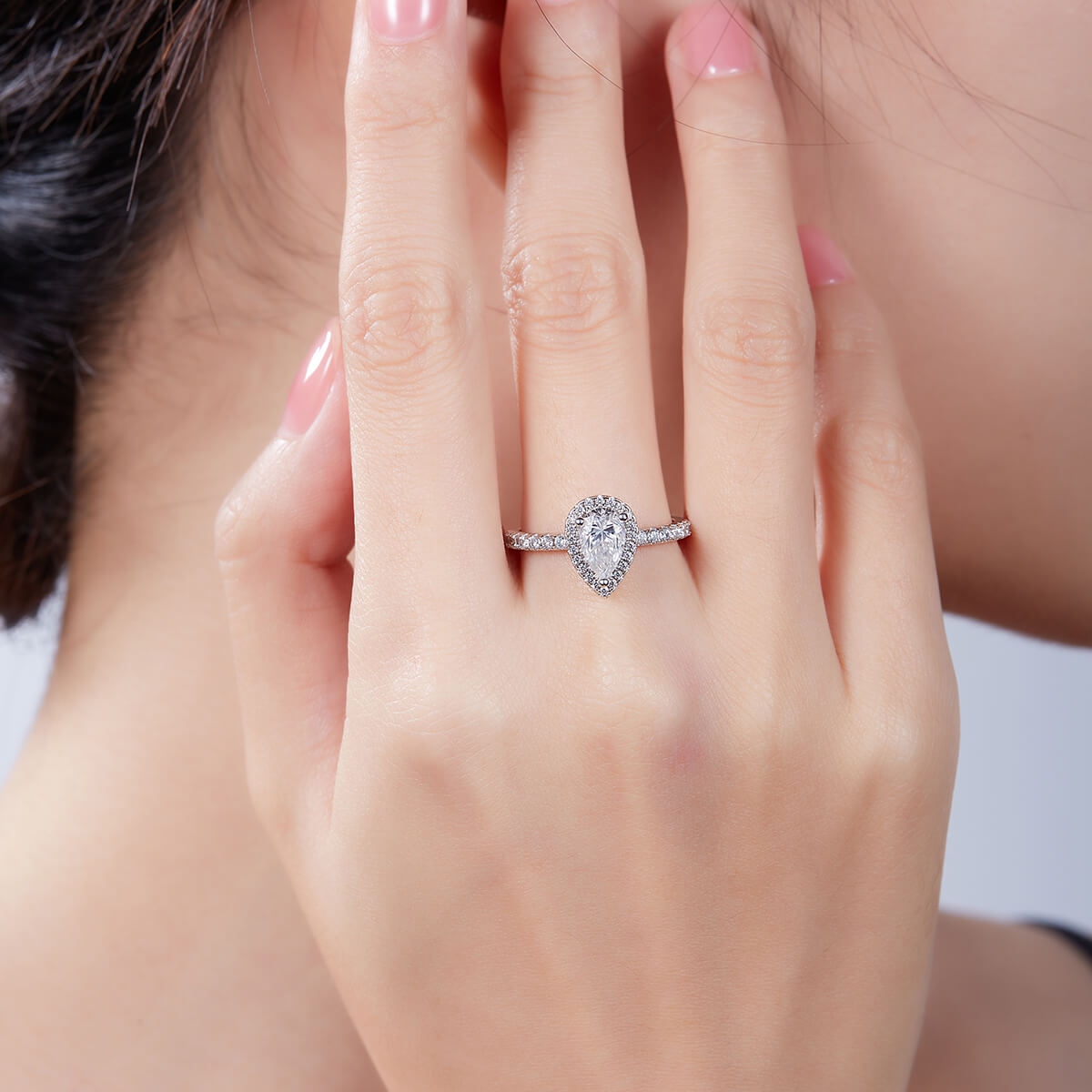 Pear cut Moissanite halo engagement ring