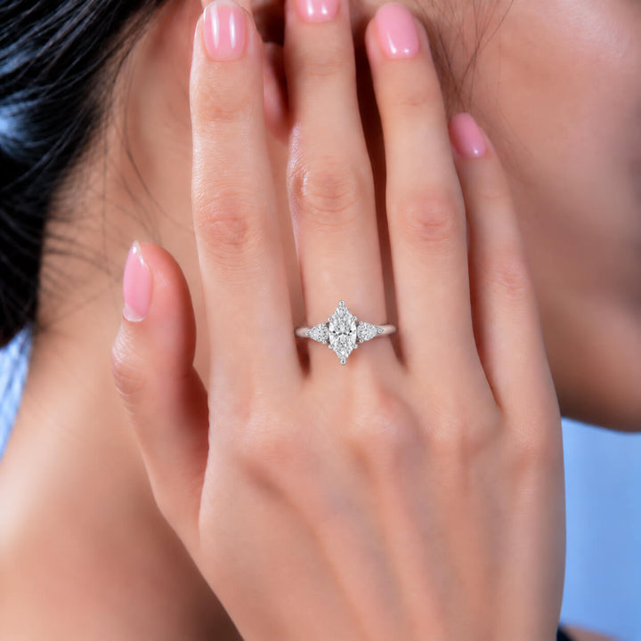 Marquise cut lab grown diamond three stones engagement ring