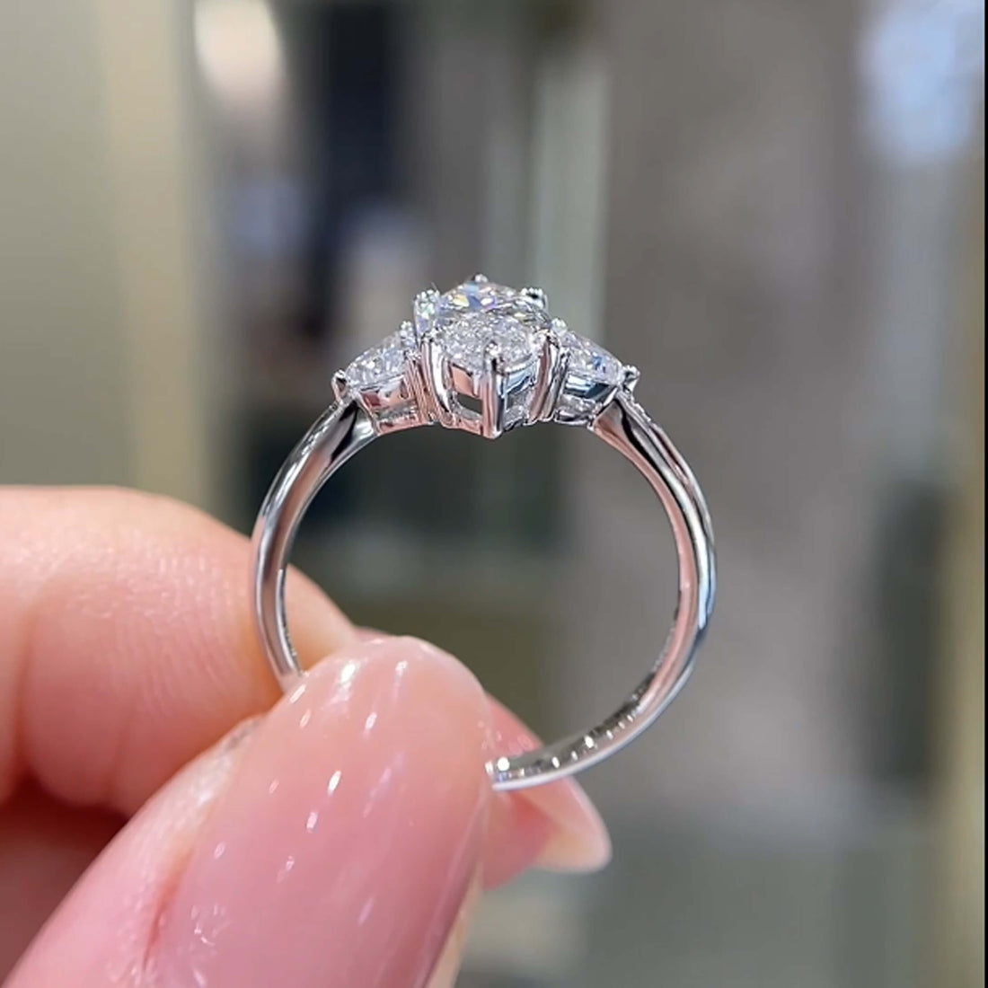 Marquise cut lab grown diamond three stones engagement ring
