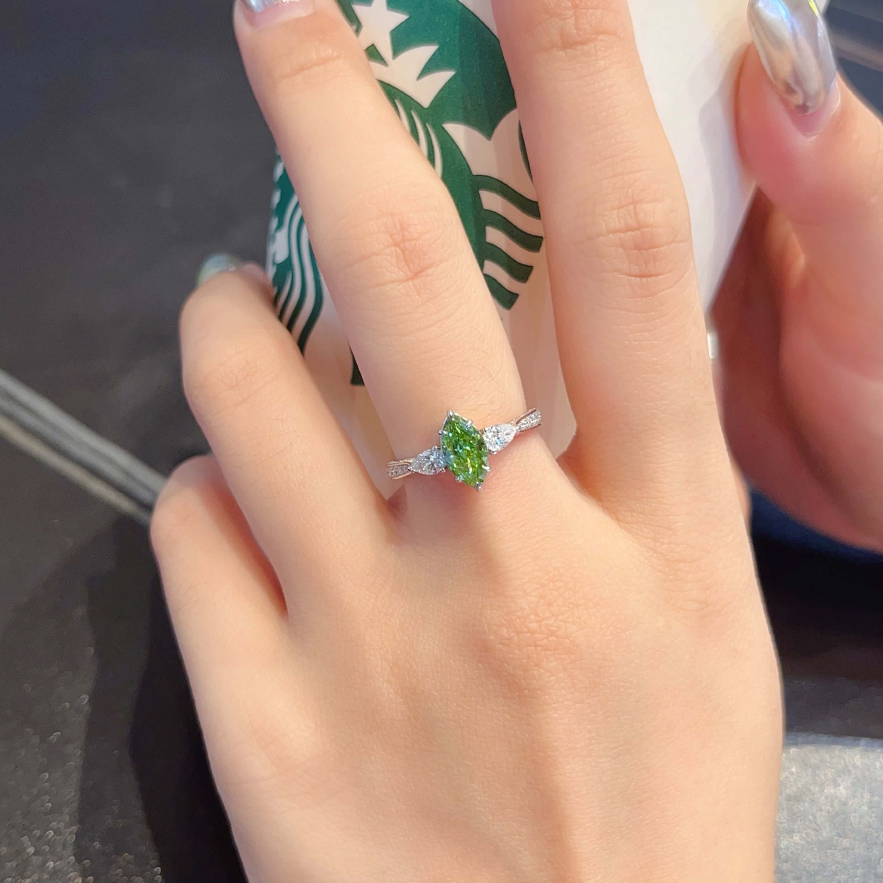 Marquise cut lab grown green diamond three stones engagement ring