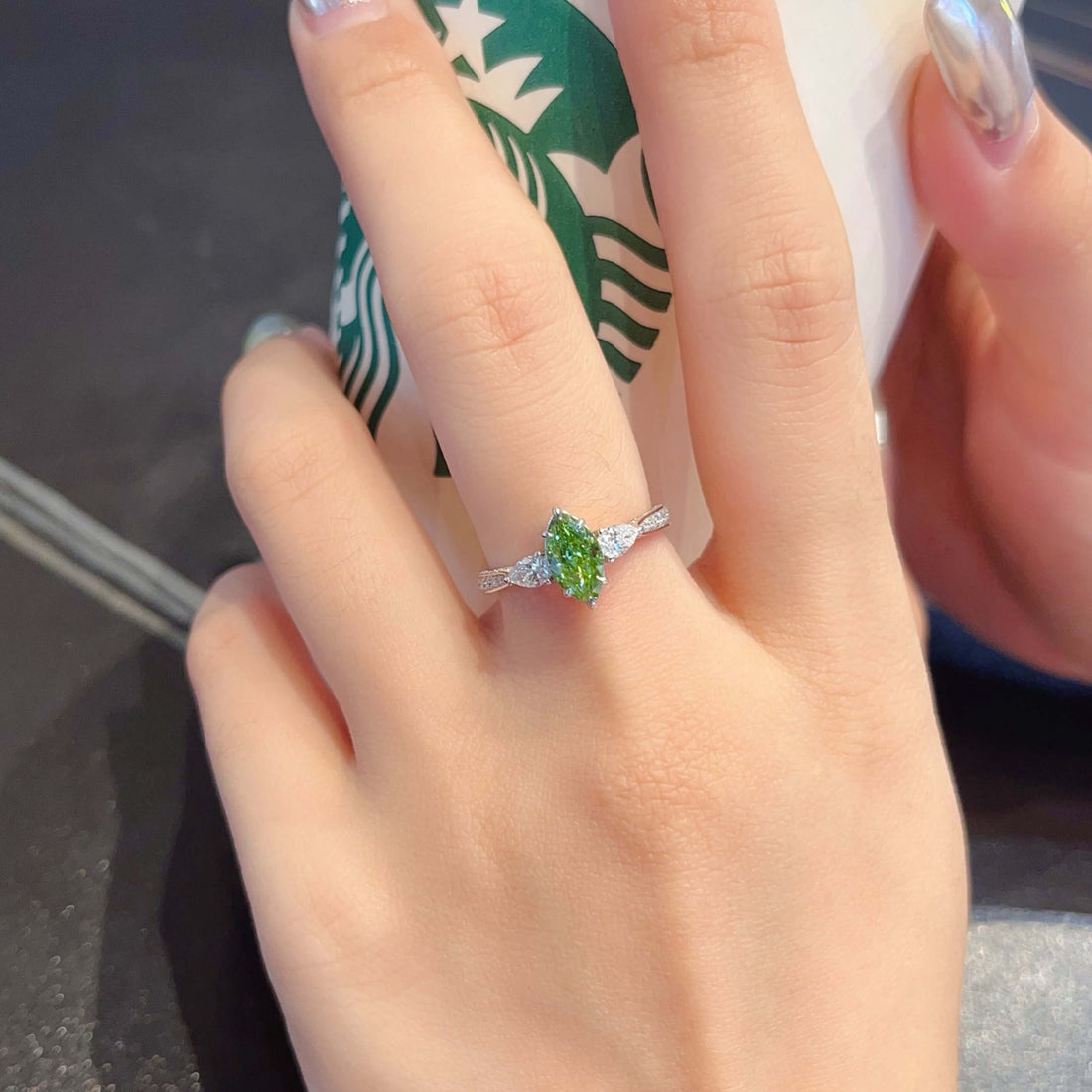 Marquise cut lab grown green diamond three stones engagement ring