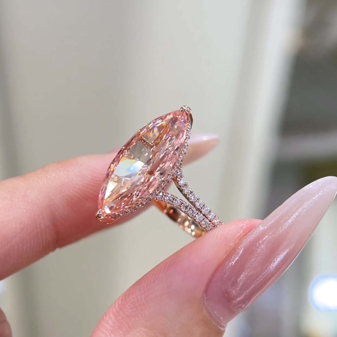 Marquise cut lab grown pink diamond engagement ring