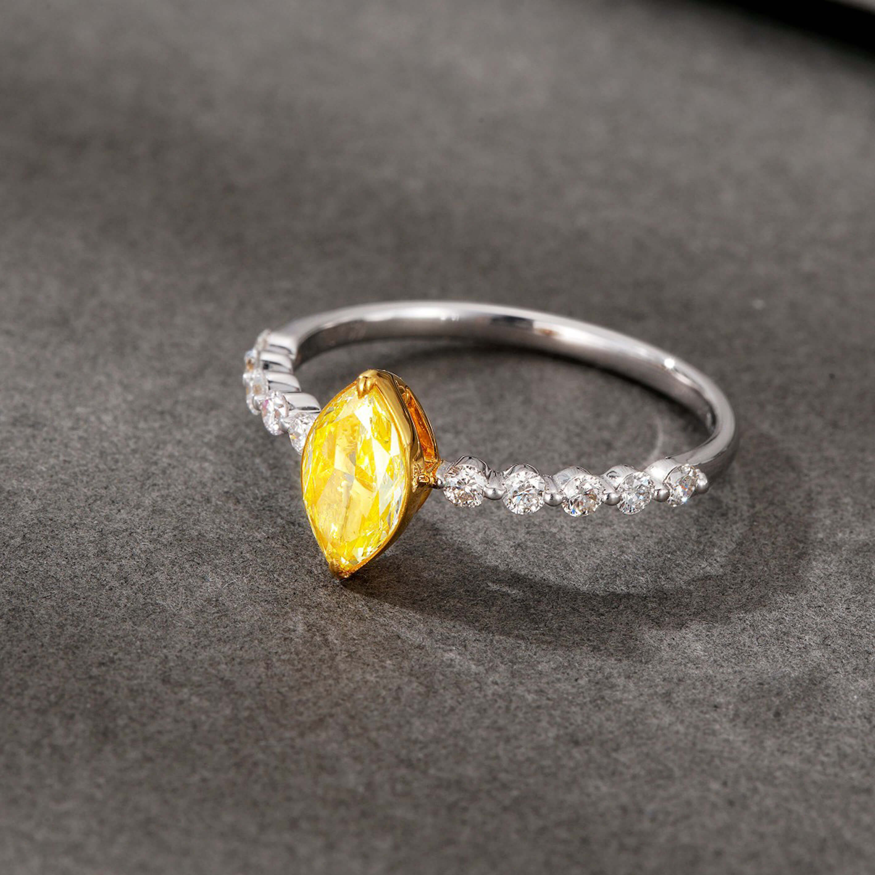 Marquise cut lab grown yellow diamond engagement ring