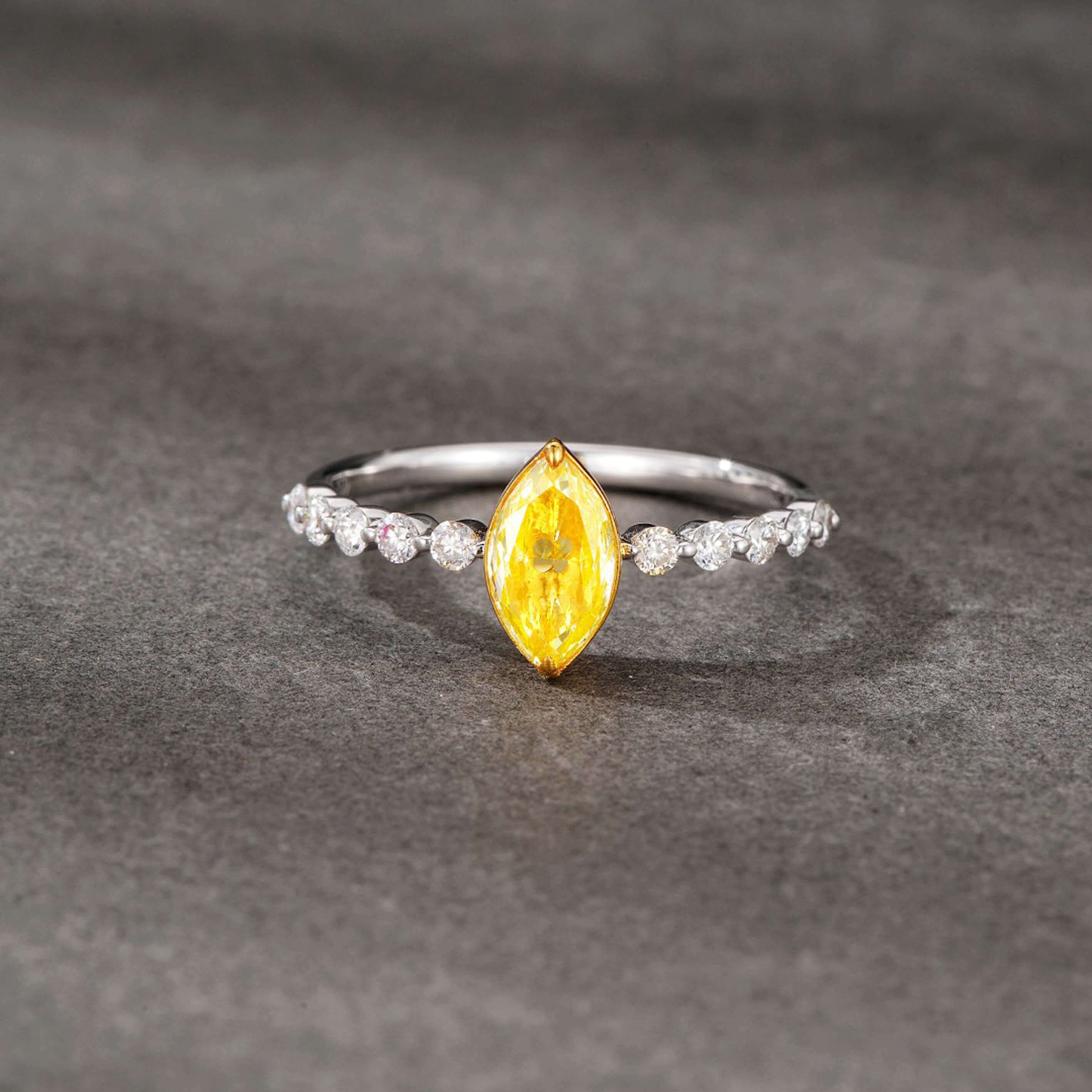 Marquise cut lab grown yellow diamond engagement ring
