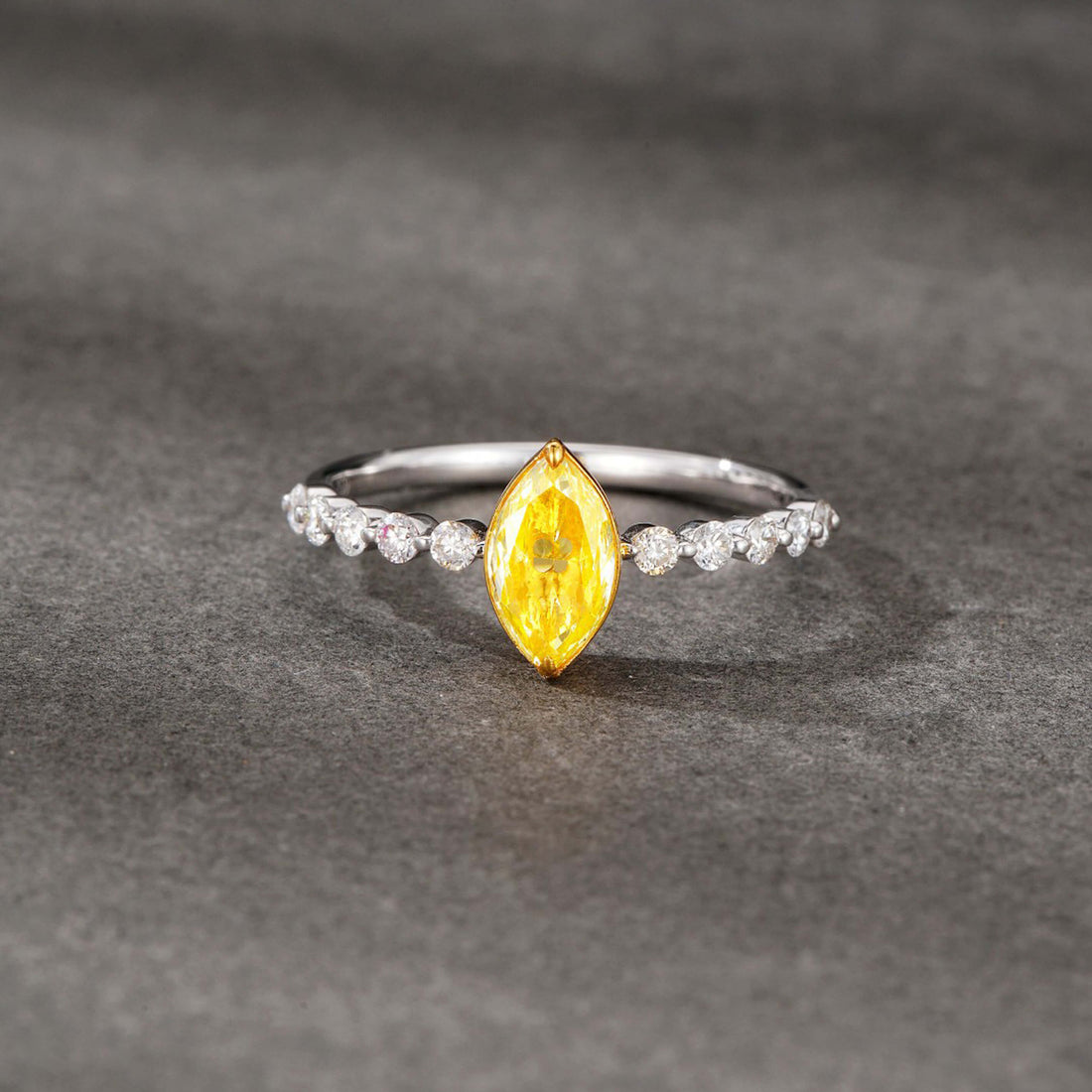 Marquise cut lab grown yellow diamond engagement ring