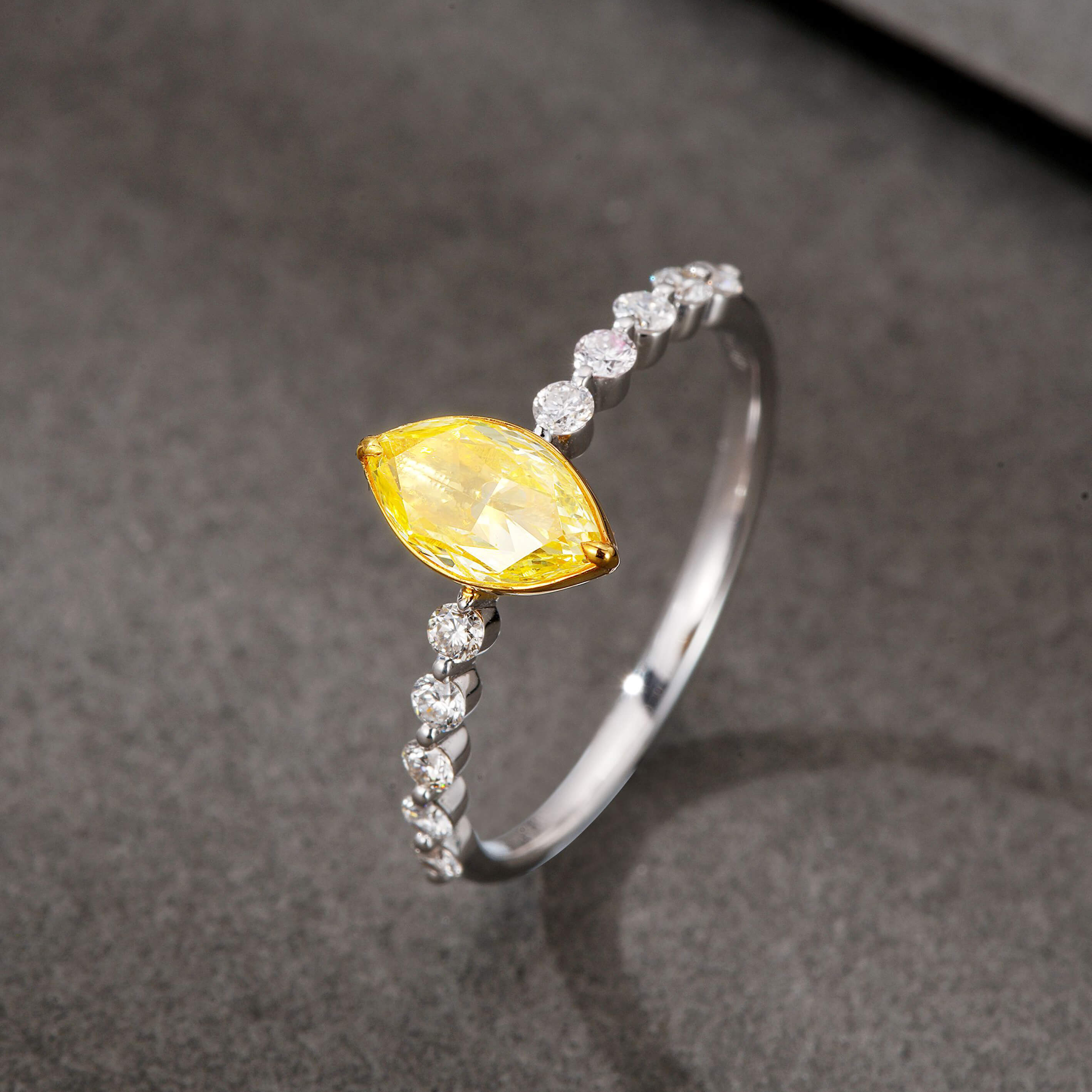 Marquise cut lab grown yellow diamond engagement ring