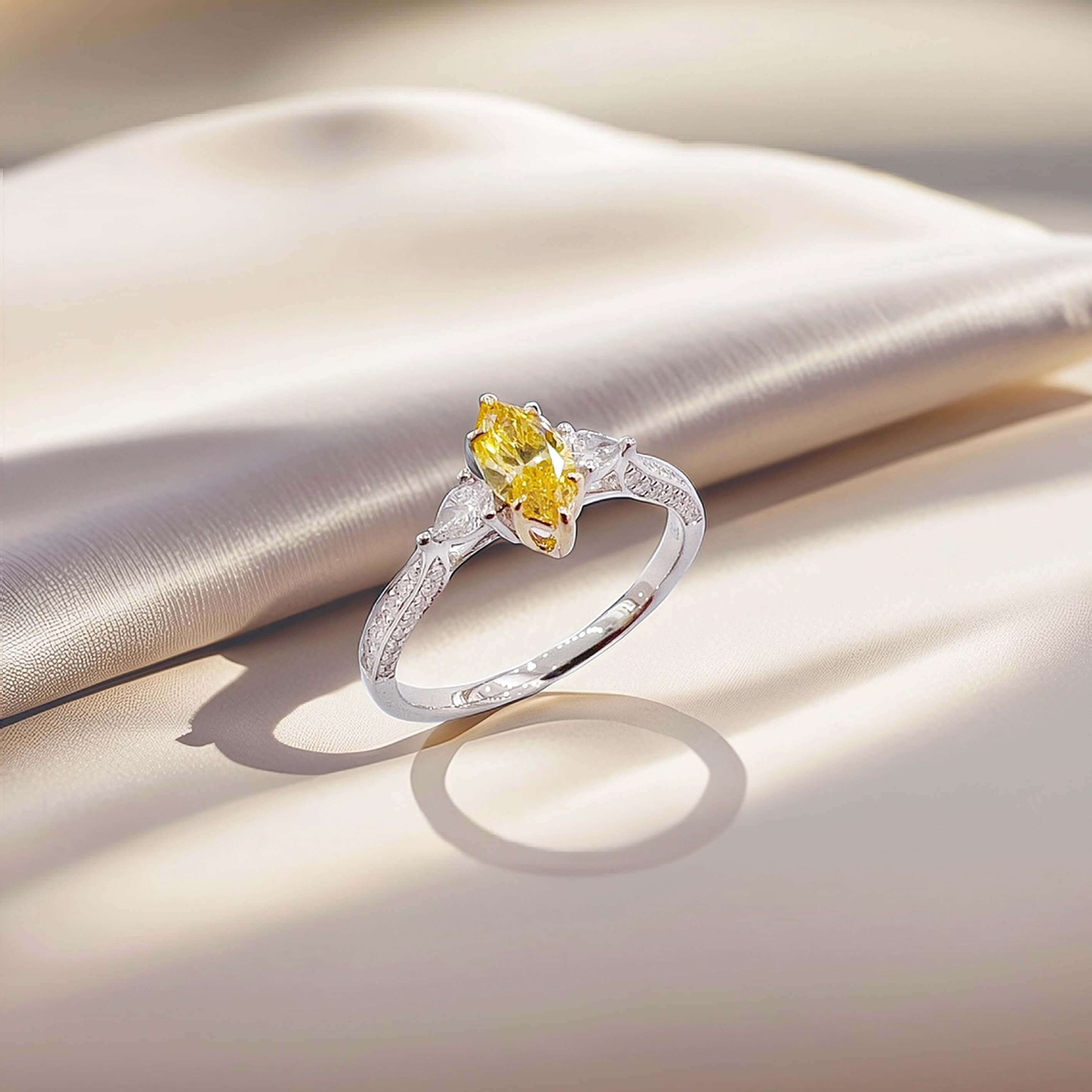 Marquise cut lab grown yellow diamond three stones engagement ring