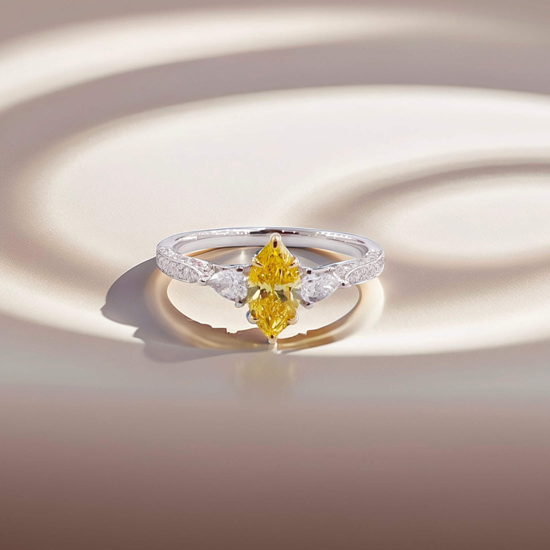 Marquise cut lab grown yellow diamond three stones engagement ring