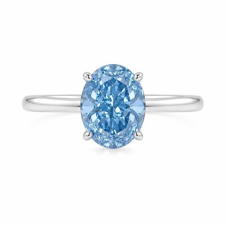 18K gold oval cut lab grown blue diamond engagement ring