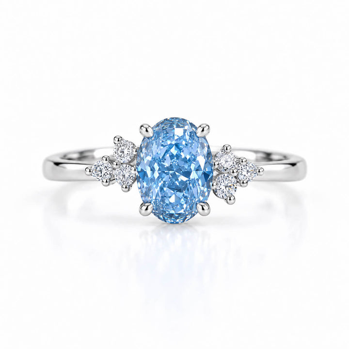 Oval cut lab grown blue diamond engagement ring