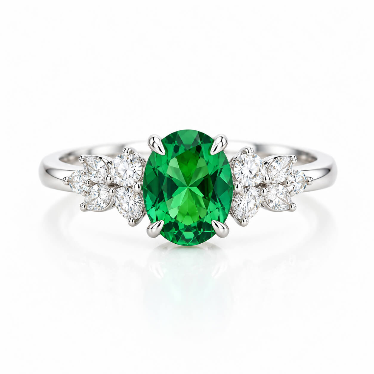 Oval cut lab grown emerald engagement ring