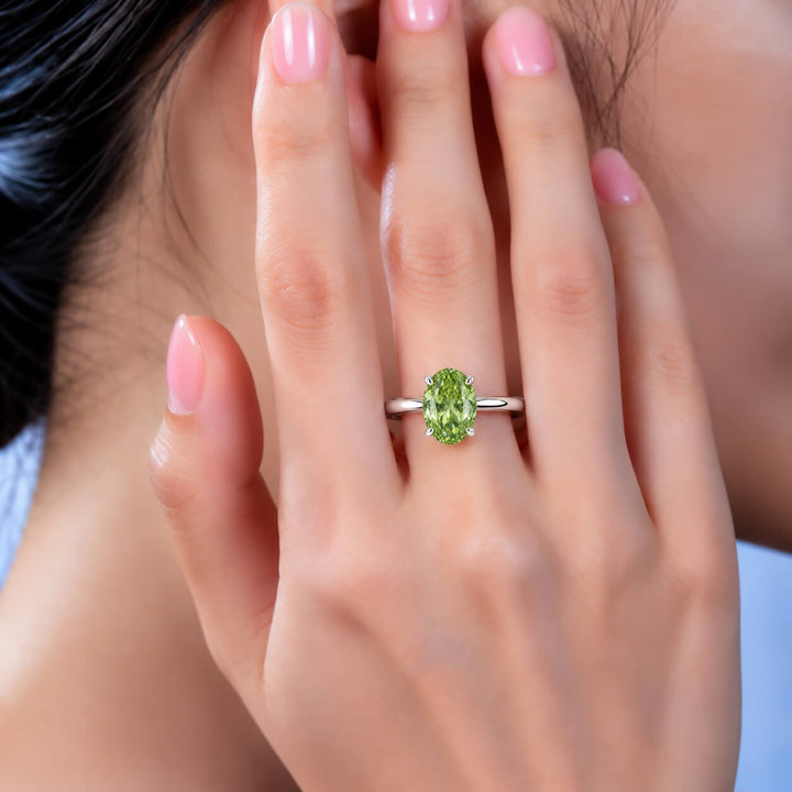 Oval cut lab grown green diamond engagement ring