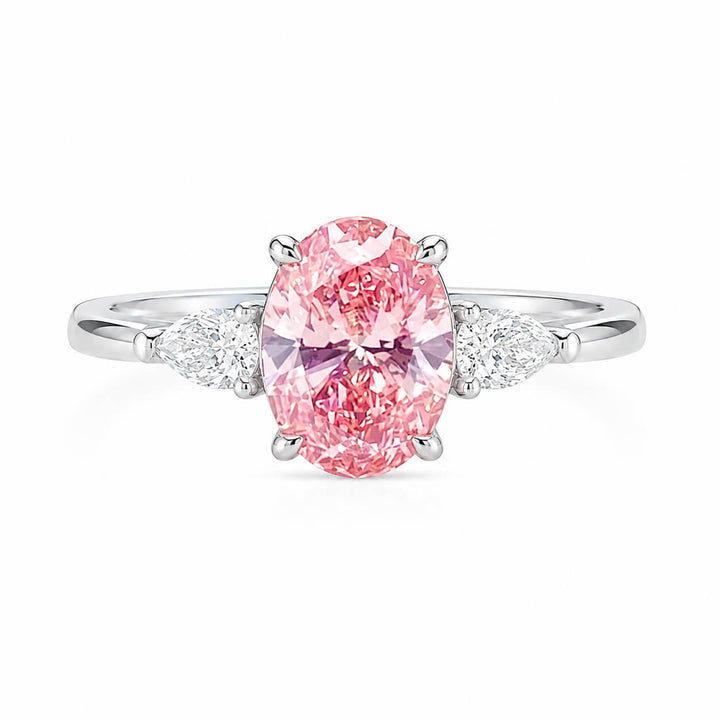 Oval cut lab grown pink diamond three stones engagement ring