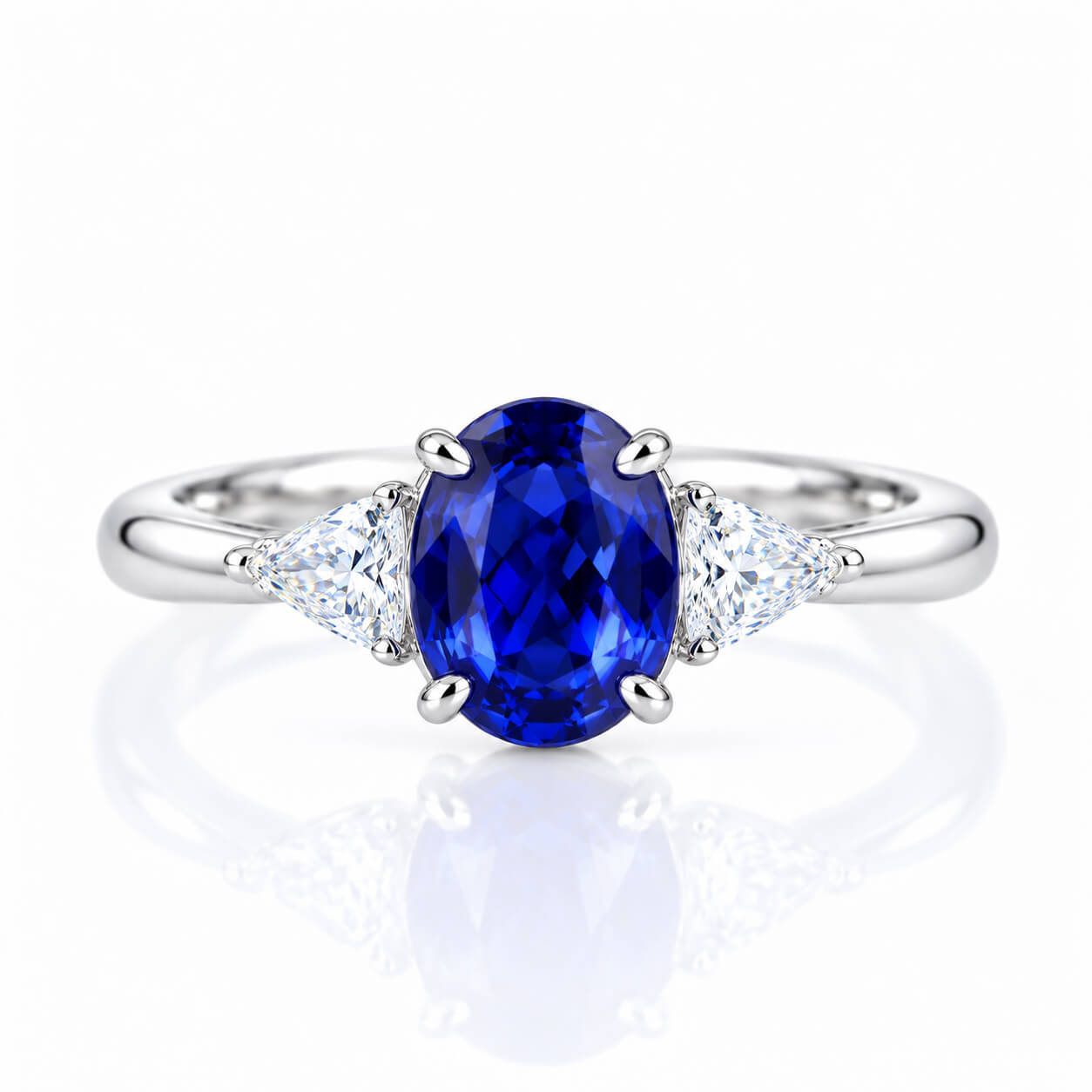 Oval cut  lab grown sapphire three stones engagement ring
