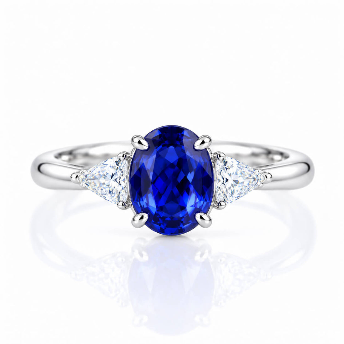 Oval cut  lab grown sapphire three stones engagement ring