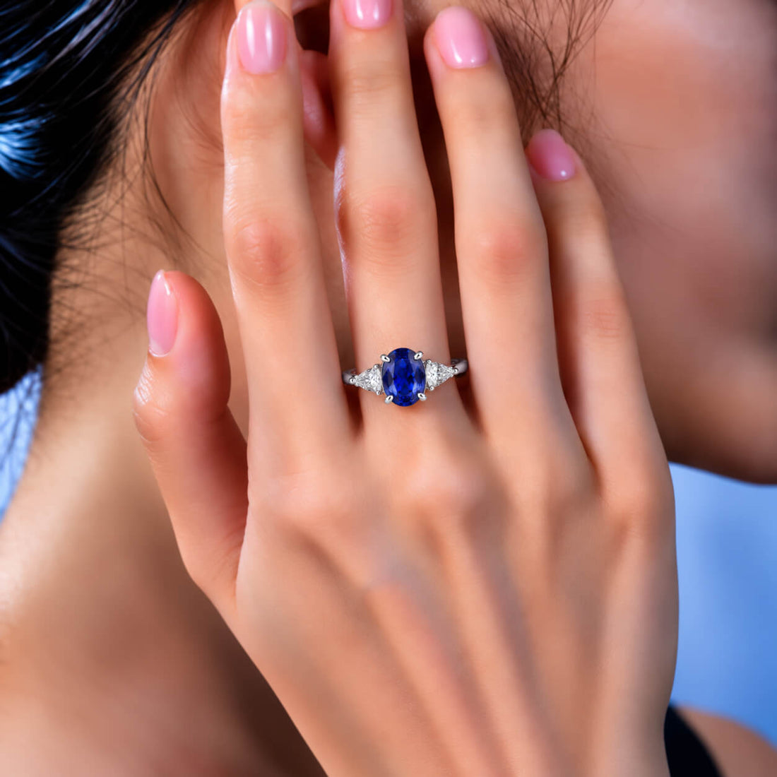 Oval cut  lab grown sapphire three stones engagement ring