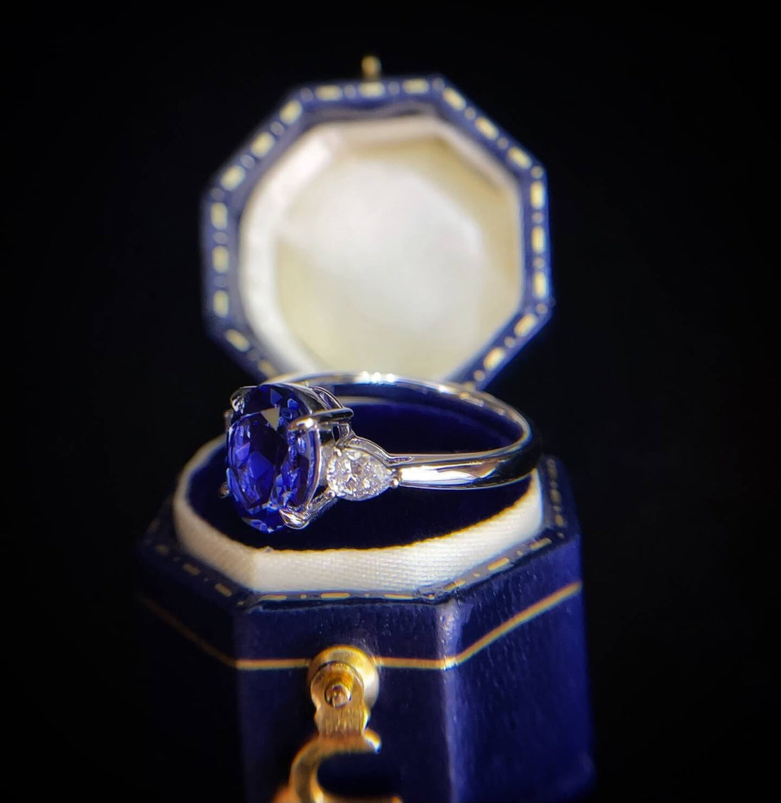 Oval cut  lab grown sapphire three stones engagement ring