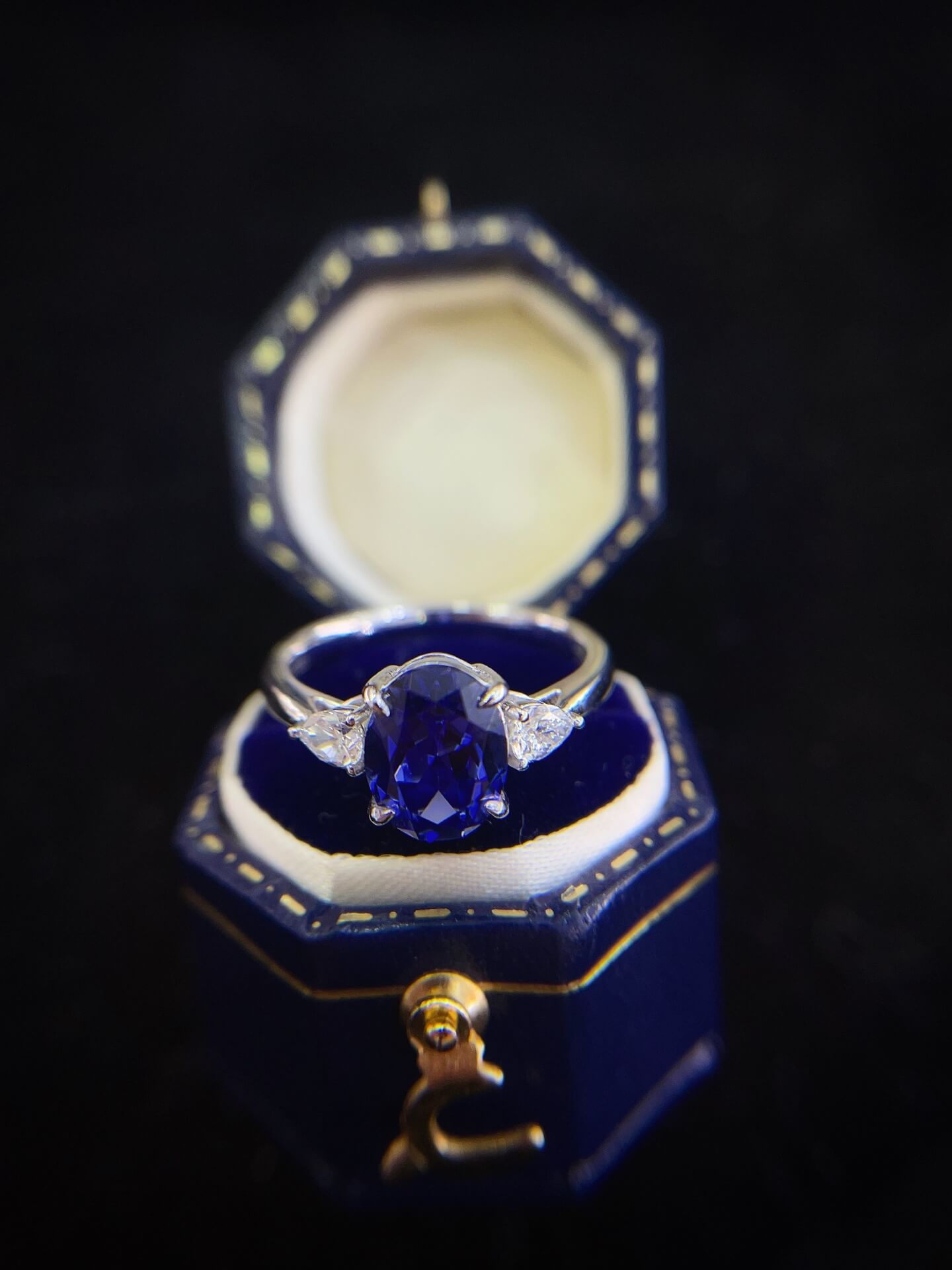 Oval cut  lab grown sapphire three stones engagement ring