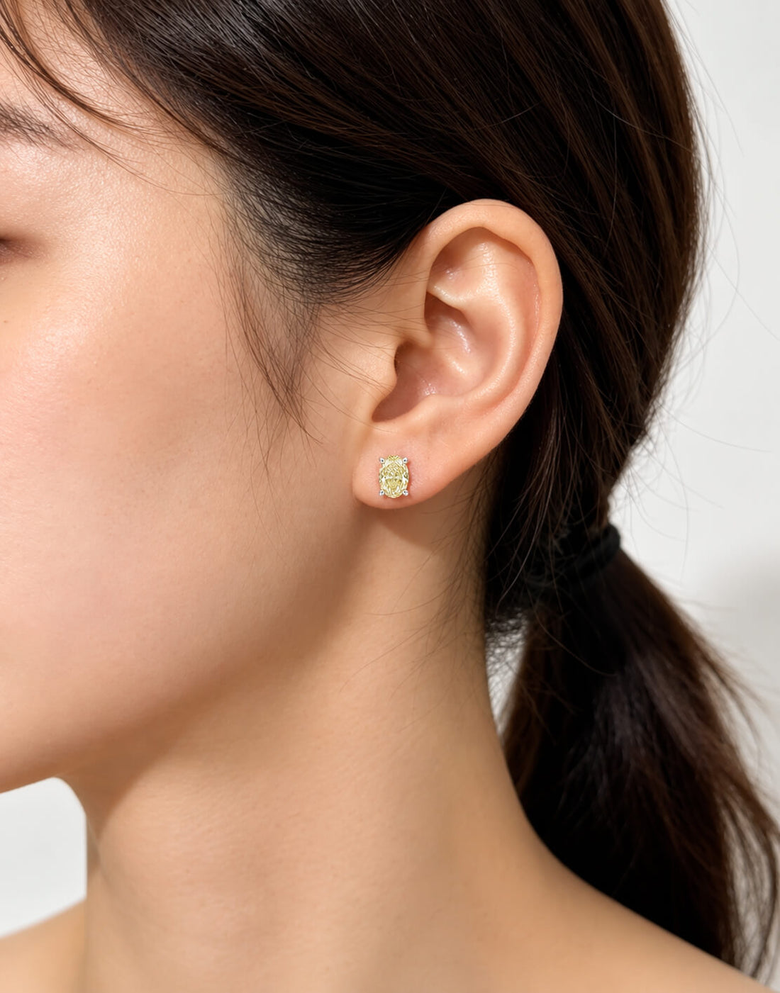Oval cut lab grown yellow diamond earrings stud