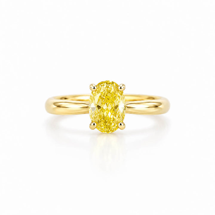 Oval cut lab grown yellow diamond engagement ring