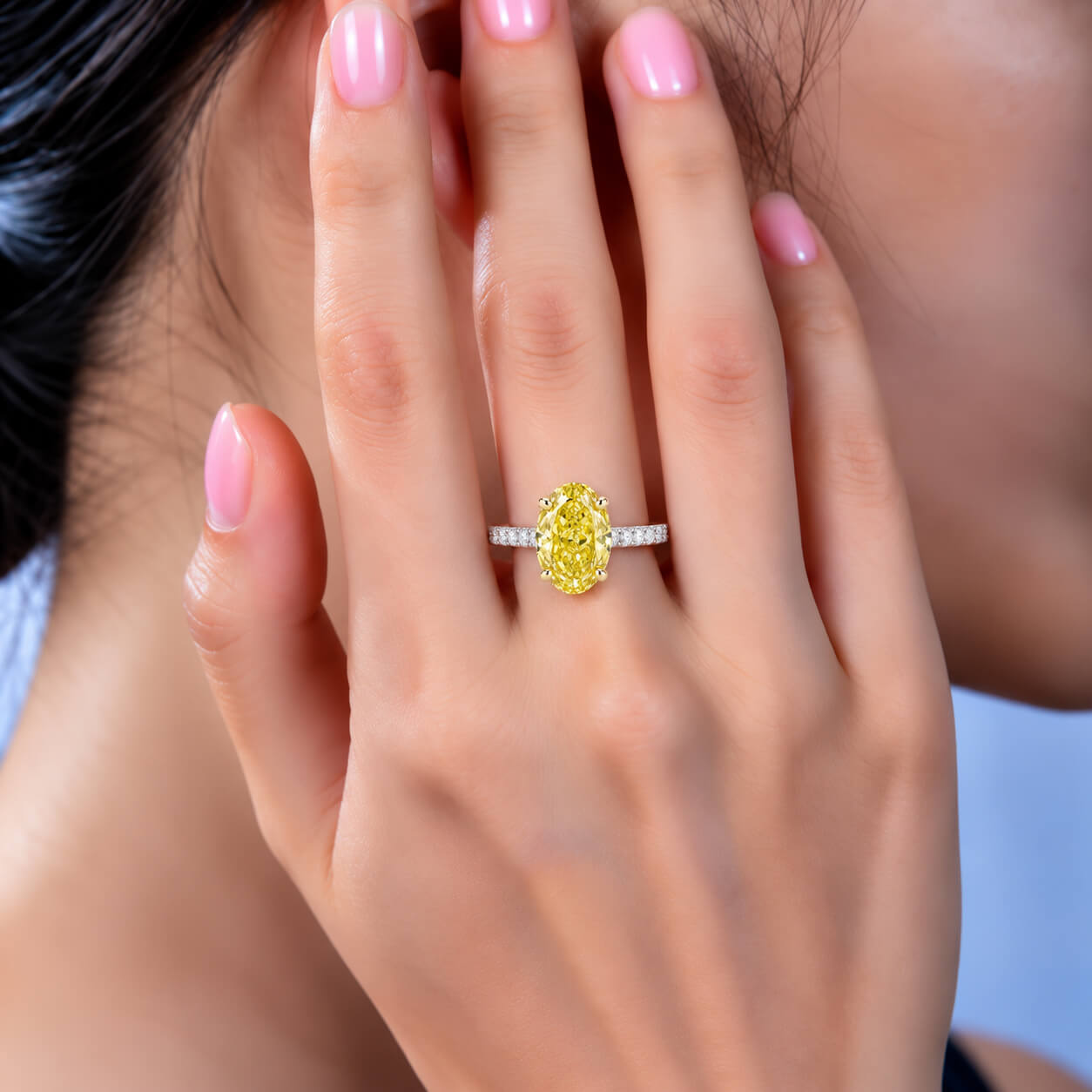 Oval cut lab grown yellow diamond engagement ring
