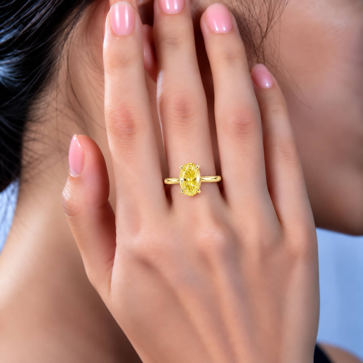 Oval cut lab grown yellow diamond engagement ring