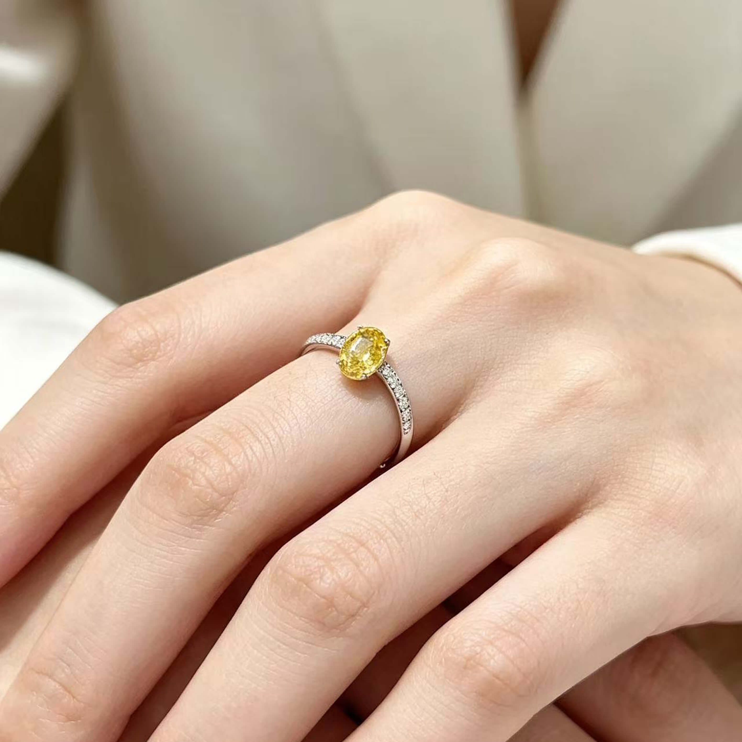 Oval cut lab grown yellow diamond engagement ring