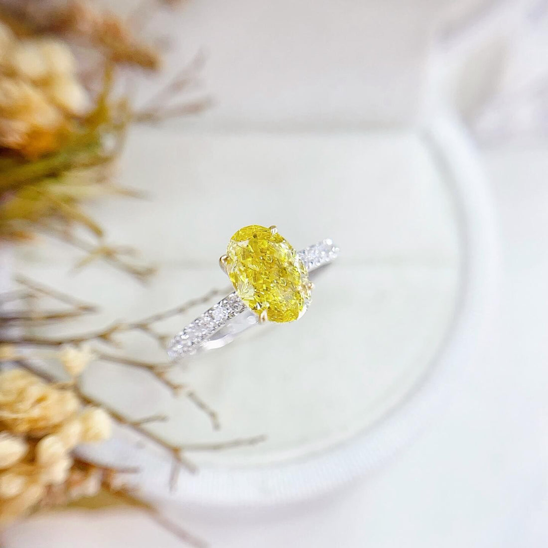 Oval cut lab grown yellow diamond engagement ring