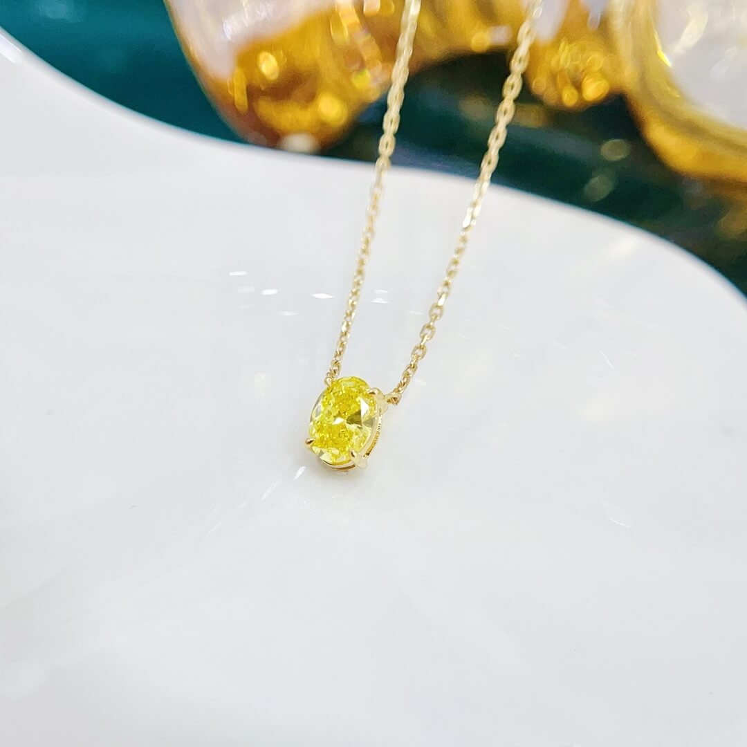 Oval cut lab grown yellow diamond pendant necklace