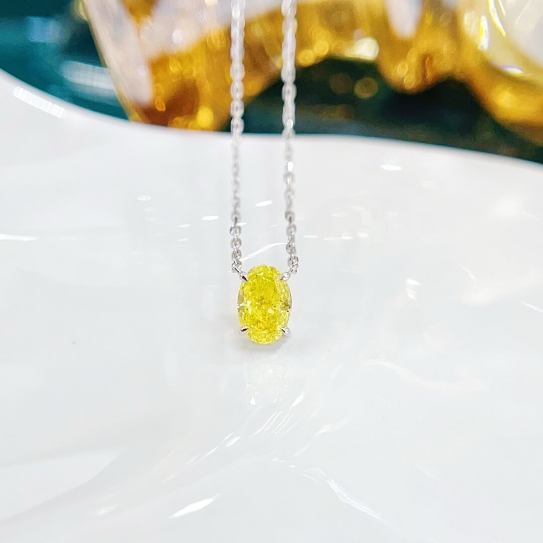 Oval cut lab grown yellow diamond pendant necklace