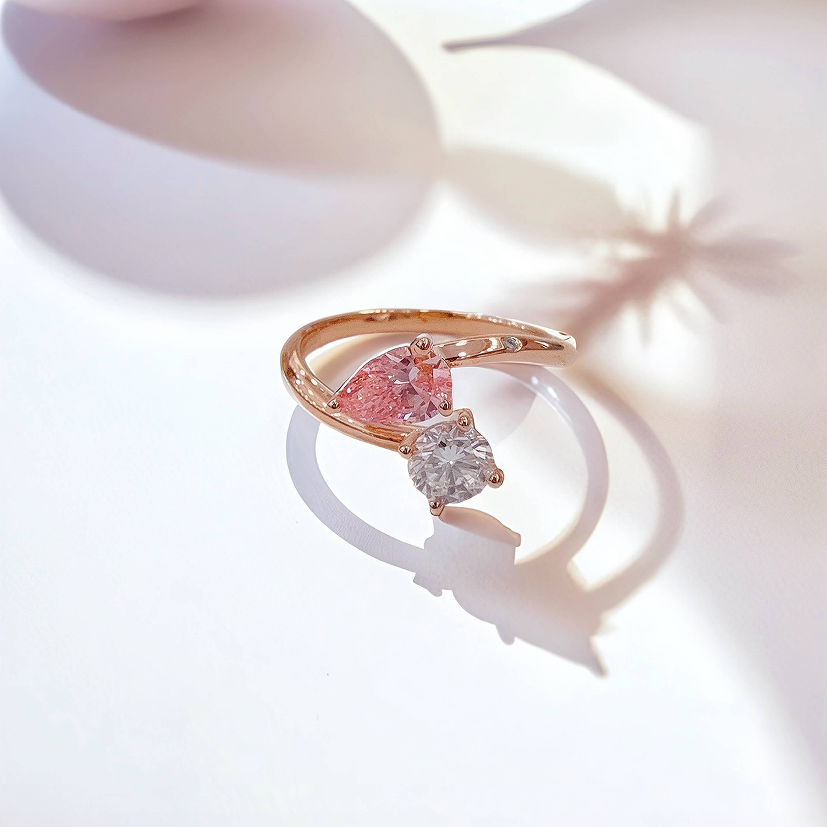 Pear and round cut lab grown diamond engagement ring