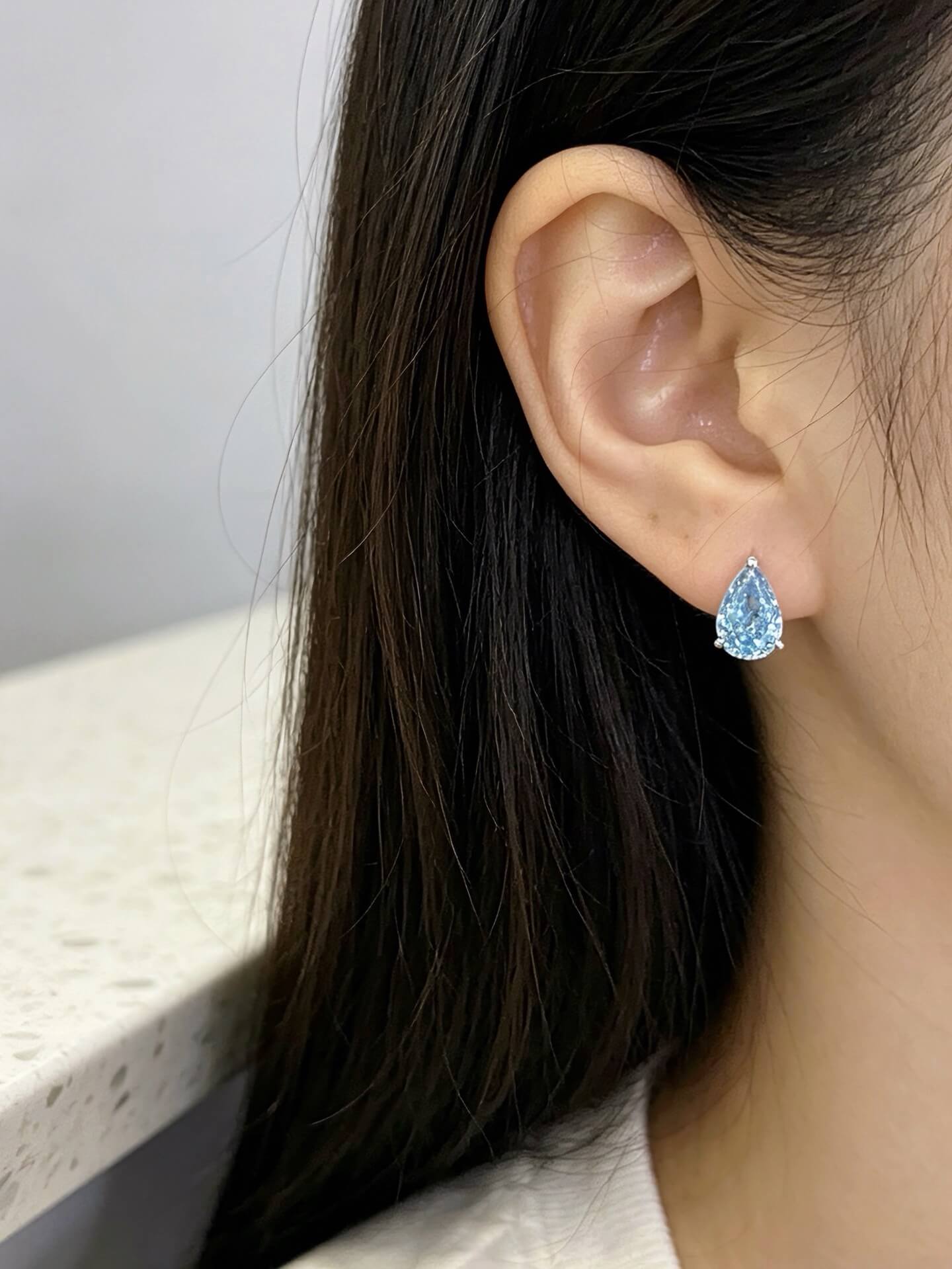 Pear cut lab grown blue diamond earrings stud