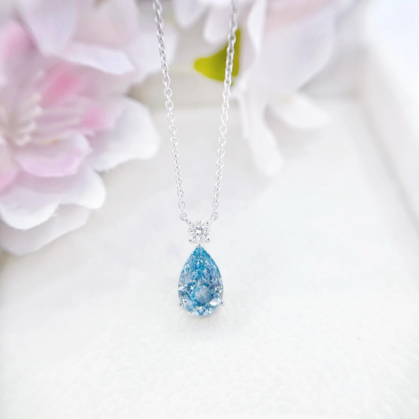 Pear cut lab grown blue diamond pendant necklace