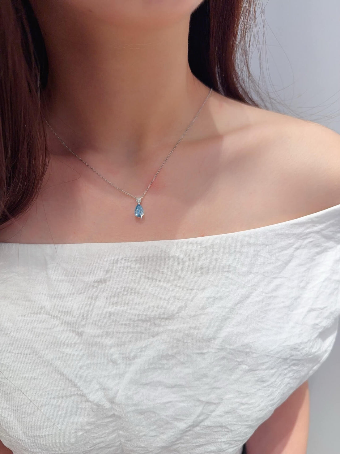 Pear cut lab grown blue diamond pendant necklace