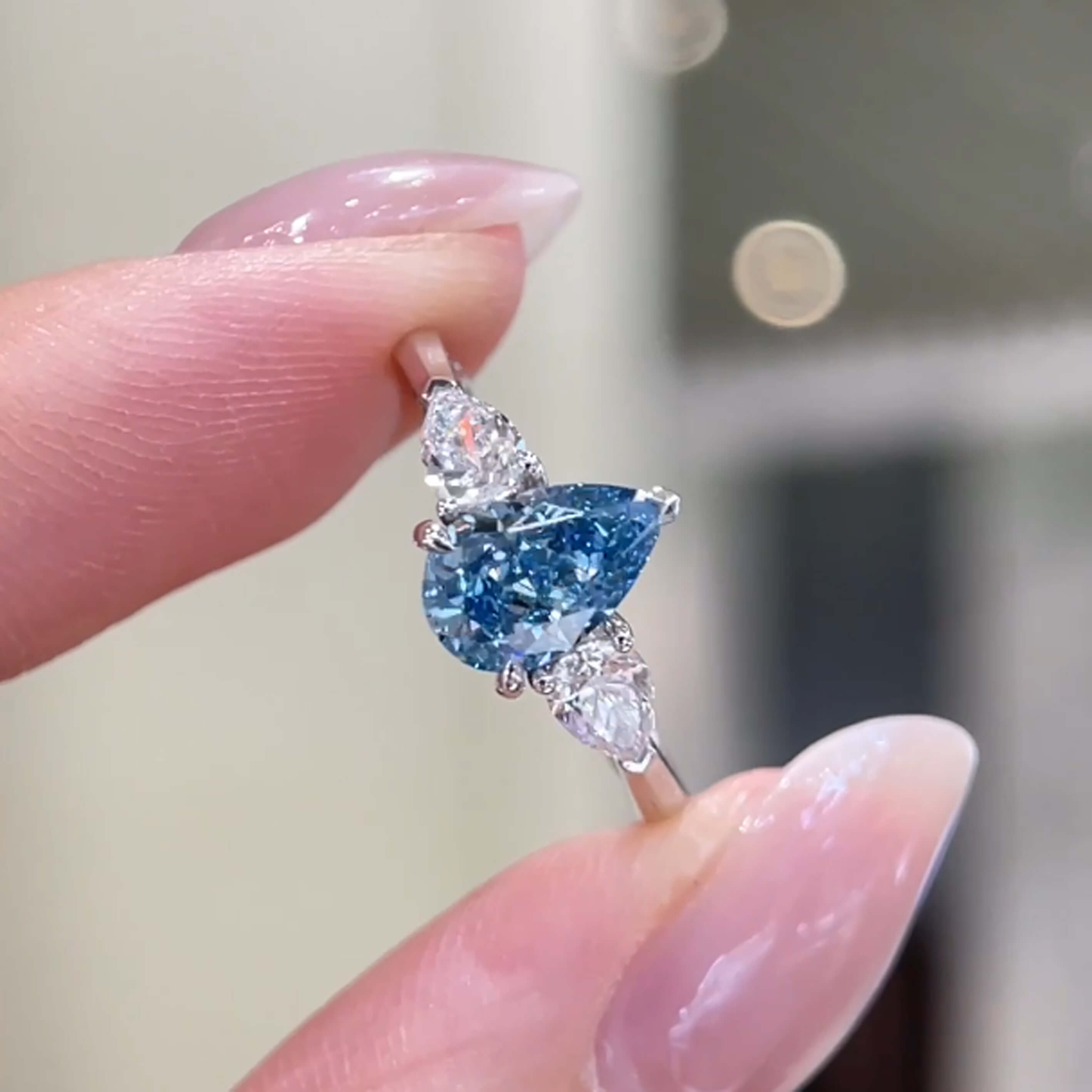 18K gold pear lab grown blue diamond three stones engagement ring