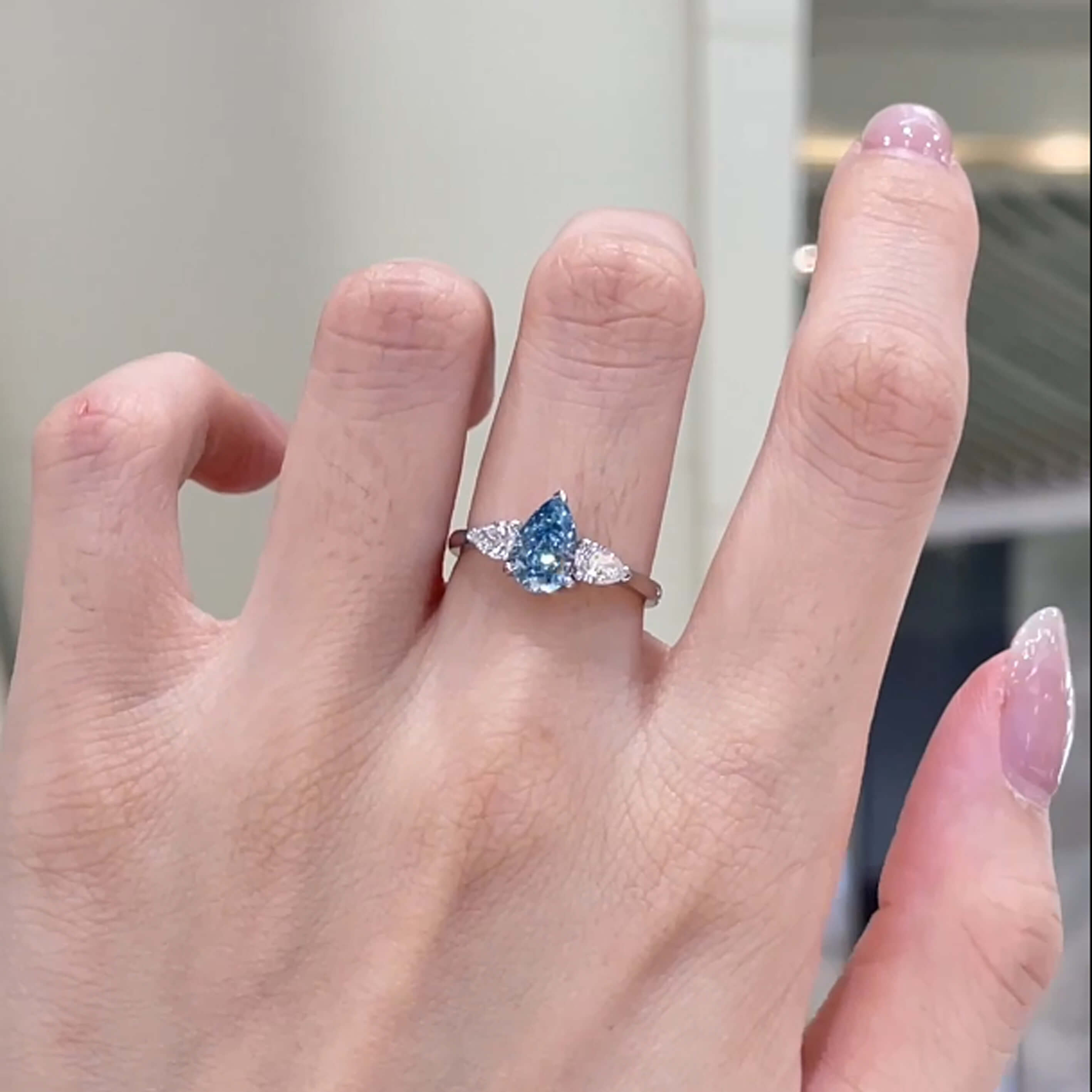 18K gold pear lab grown blue diamond three stones engagement ring
