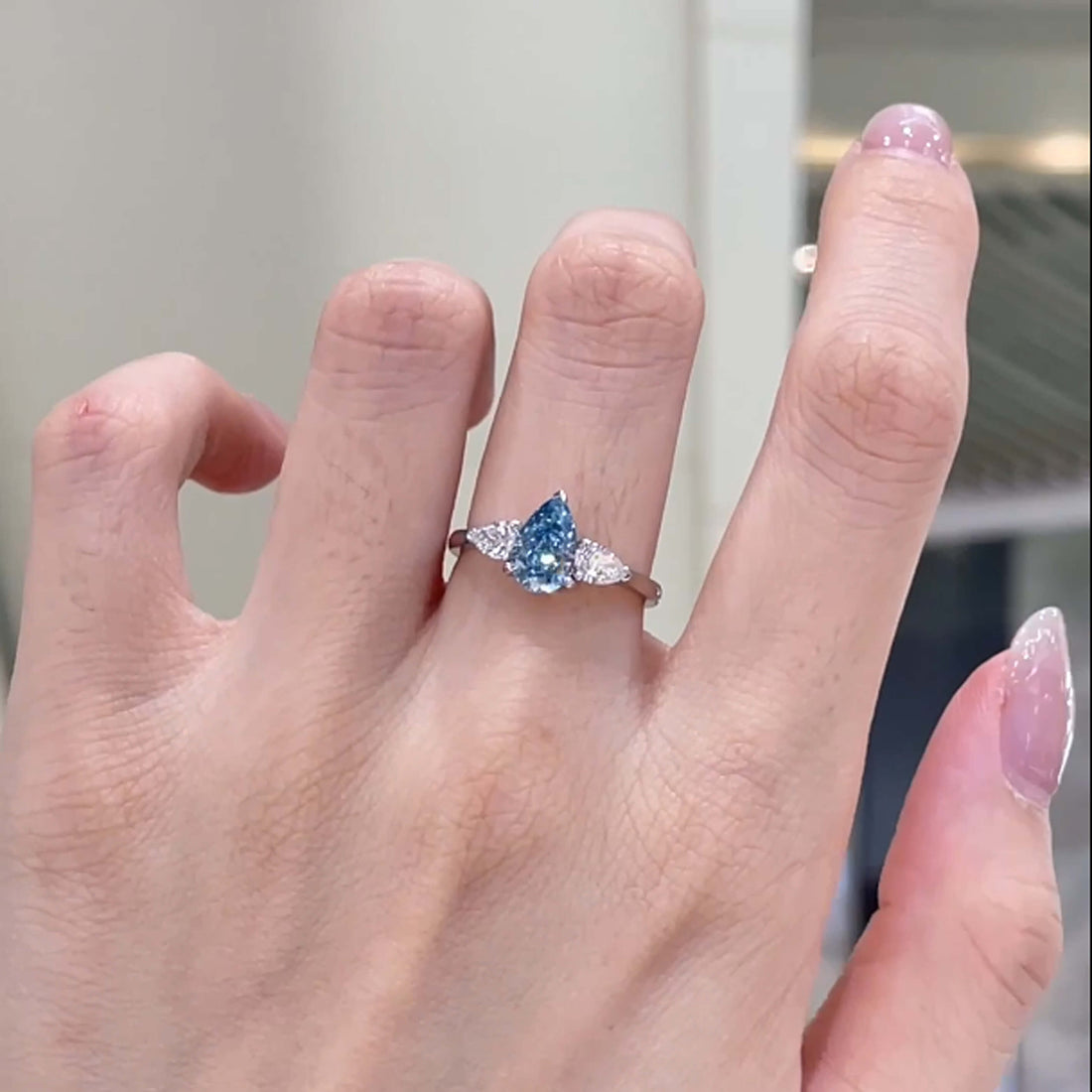 18K gold pear lab grown blue diamond three stones engagement ring