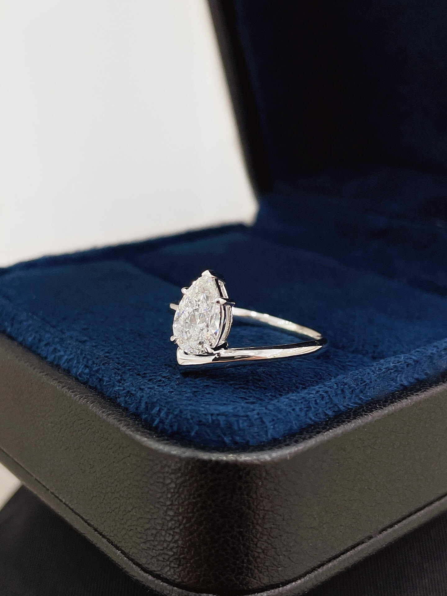 Pear cut lab grown diamond engagement ring