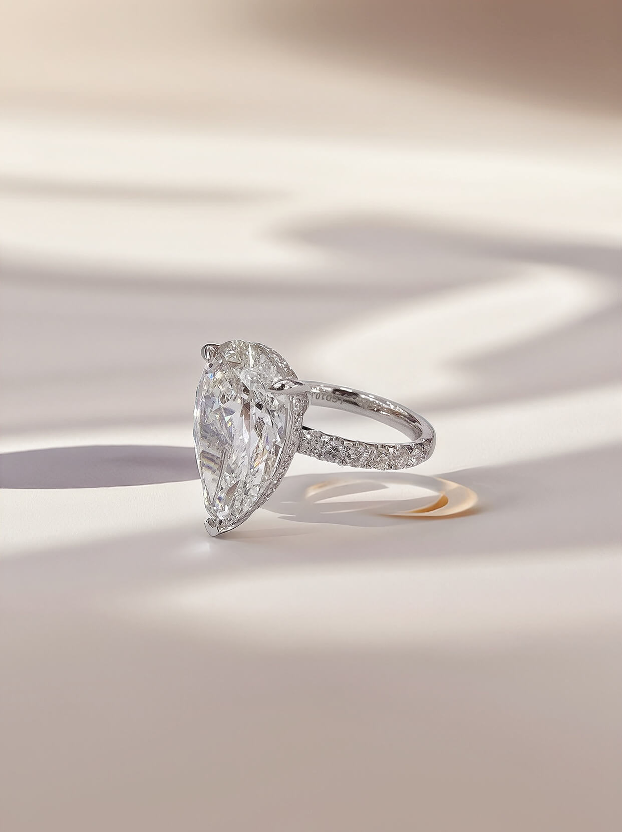 Pear cut lab grown diamond engagement ring