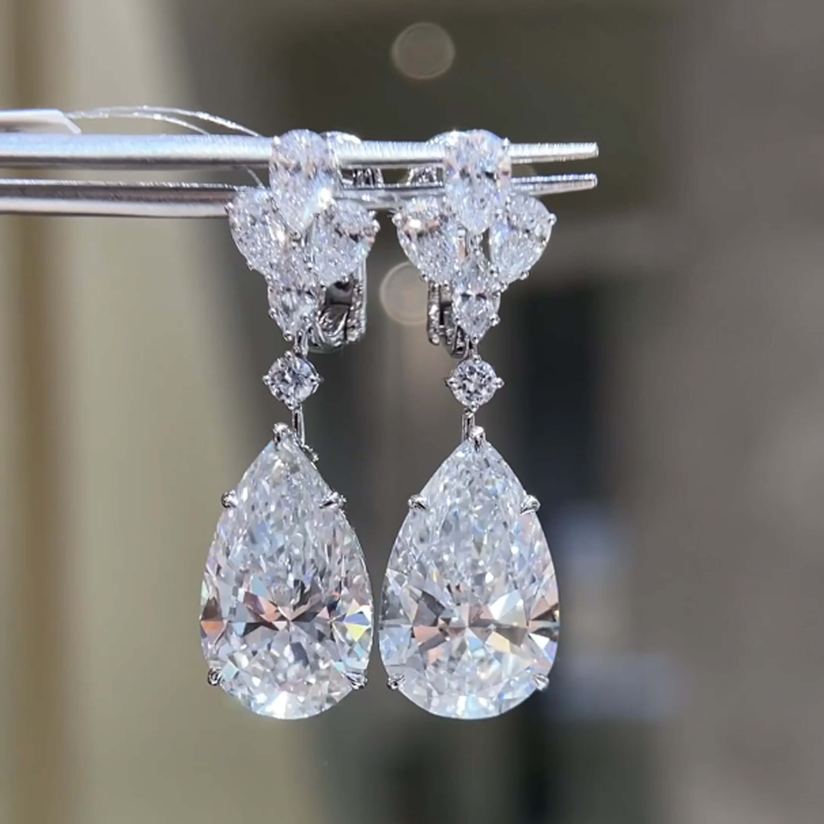 Pear cut lab grown diamond hoop earrings