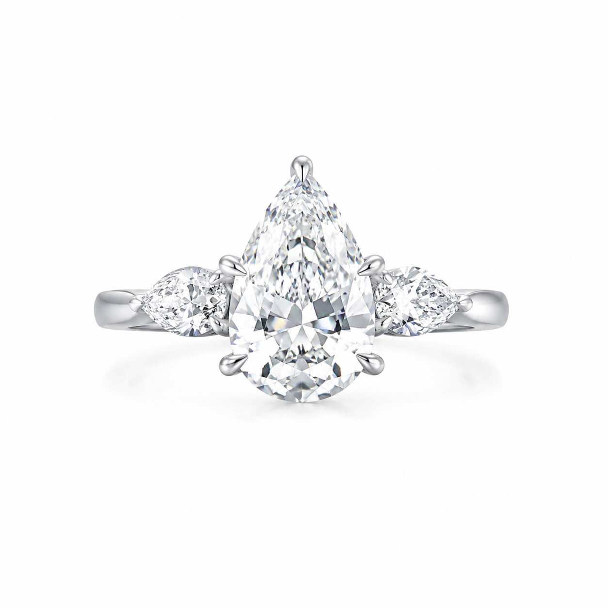 Pear cut lab grown diamond three stones engagement ring