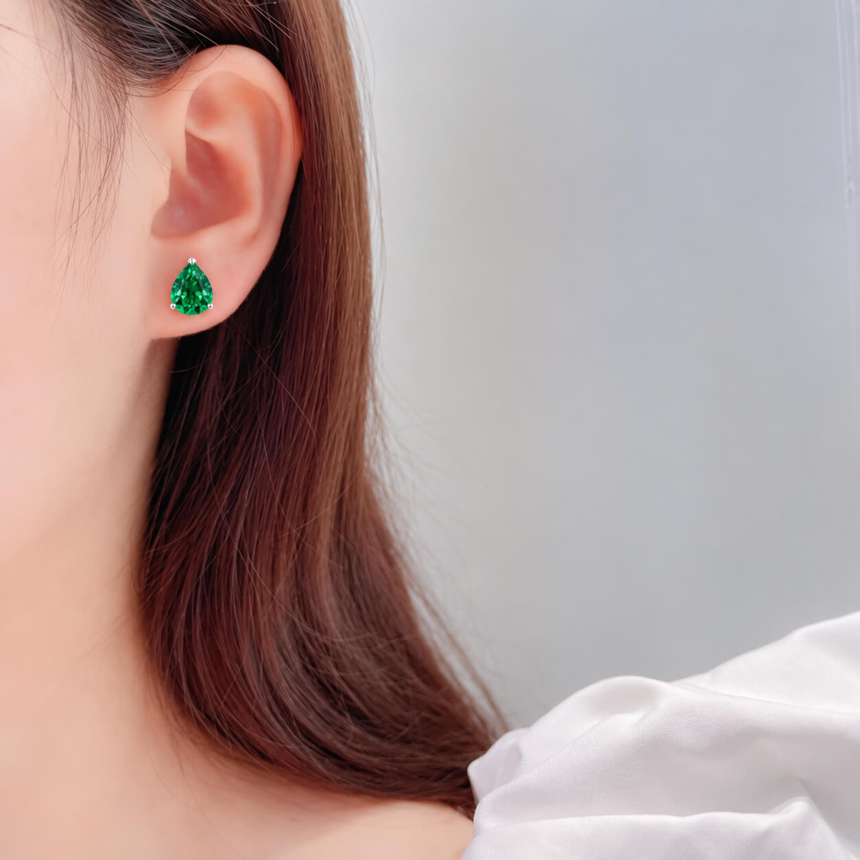 Pear cut lab grown emerald earrings stud