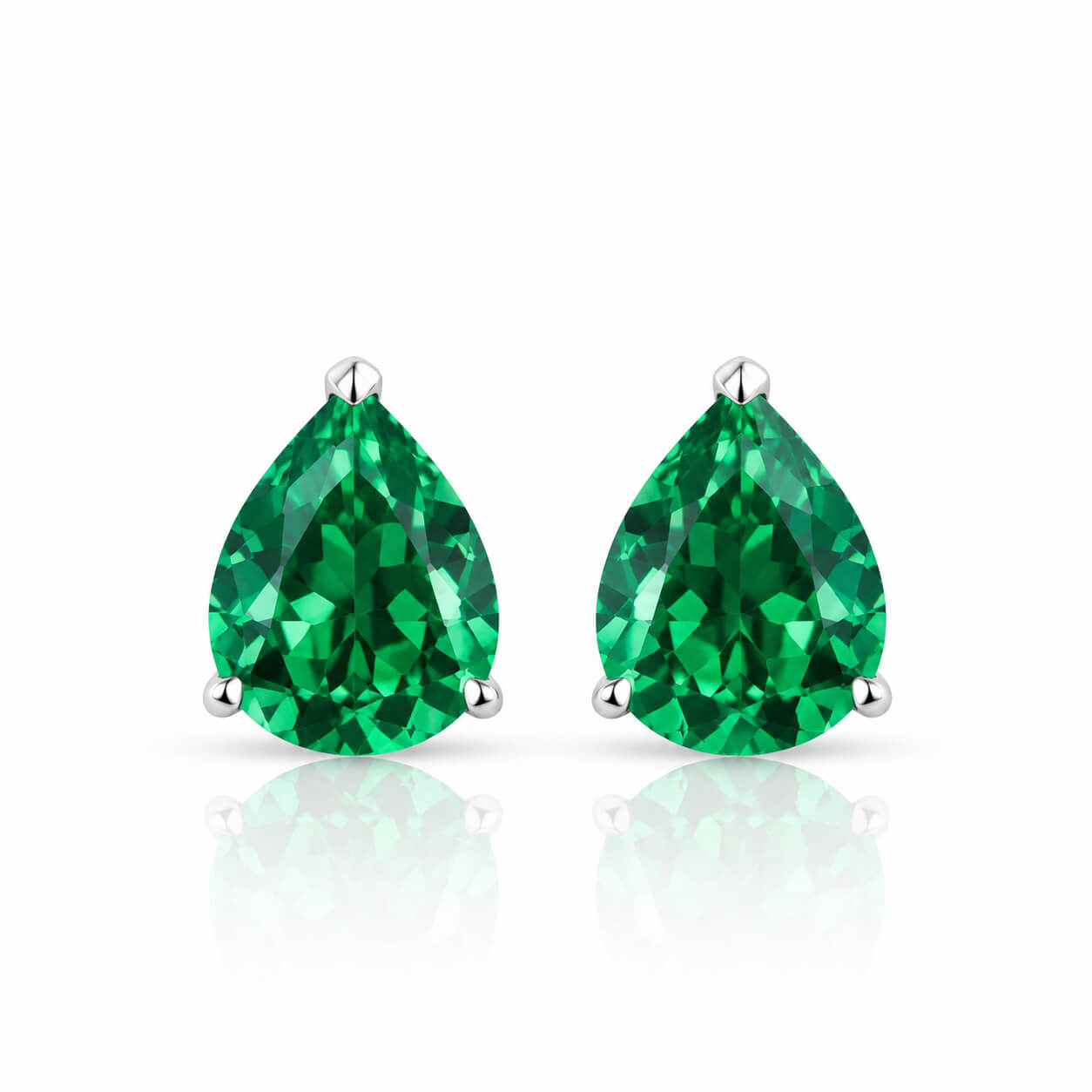 Pear cut lab grown emerald earrings stud