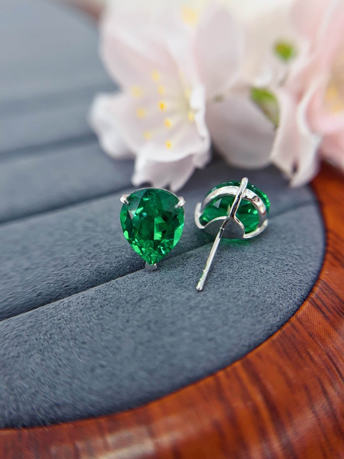Pear cut lab grown emerald earrings stud